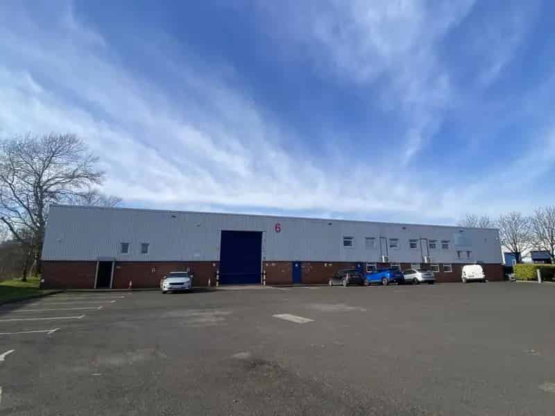 Modern Industrial Warehouse with Three Roller Shutter Doors