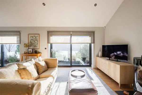 Stylish Architect Designed Bungalow with Open Plan Living and Landscaped Gardens