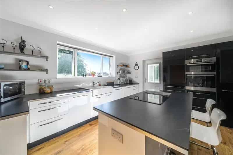 Elegant Detached Home with Orangery and Landscaped Gardens