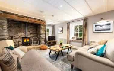 Grade II Listed Coastal Property with Inglenook Fireplaces and Ample Parking