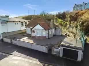 Seafront Bungalow with Breathtaking Views and Development Potential