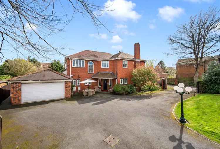 Spacious Detached Family Home with Large Gardens and Double Garage