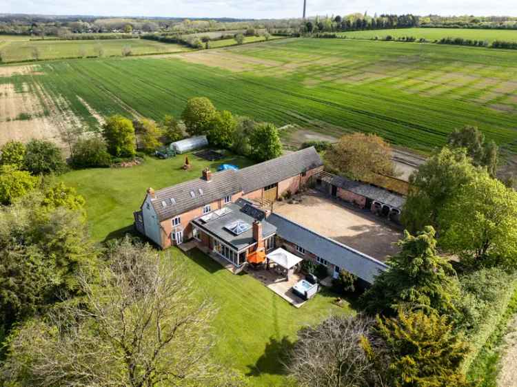 Historic 5-Bedroom Country House with Extensive Gardens and Barns