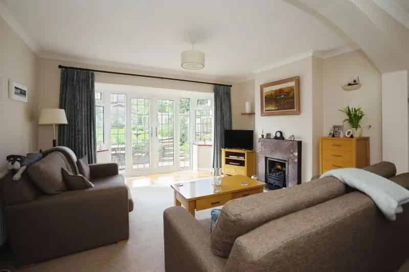 Spacious 3-Bedroom Semi-Detached House with Garage and Gardens