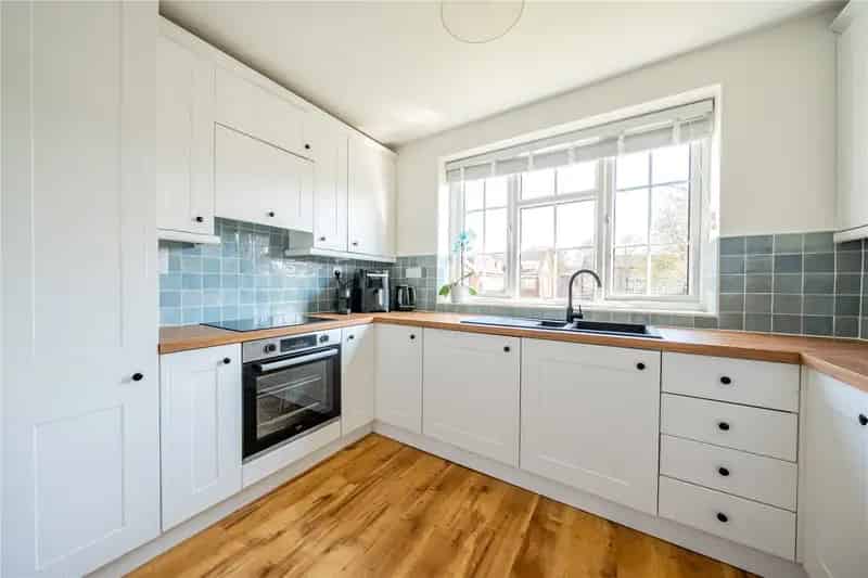 2-Bedroom Apartment with Private Garage Near Amenities