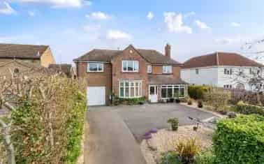 Spacious Family Home with Outbuildings and Delightful Gardens