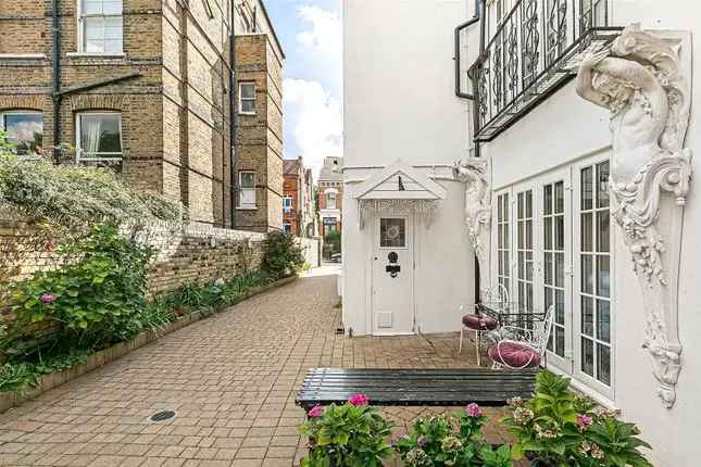 Terraced house for sale in Greencroft Gardens, London NW6