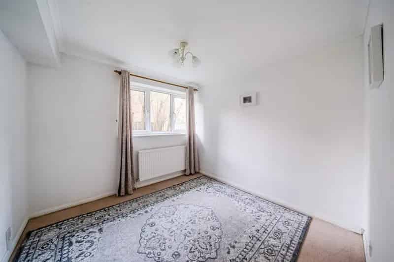 Two-Bedroom Town Centre Apartment with Parking and Garden