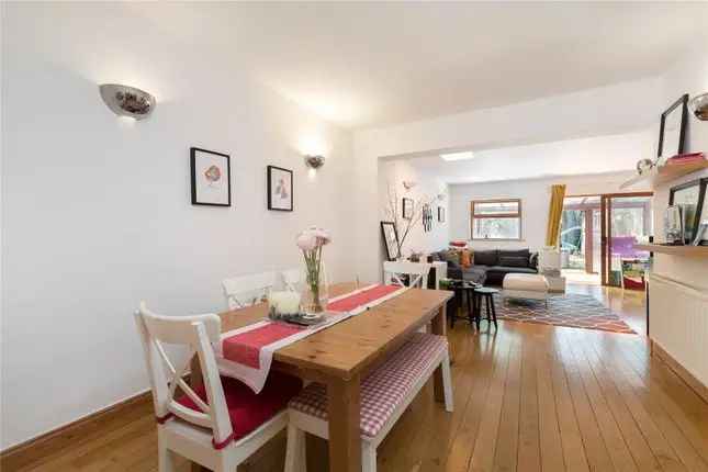 Terraced house for sale in Hartfield Crescent, London SW19