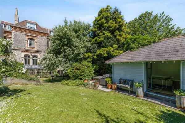 Grand Period Apartment with Stunning Garden and Downs Access