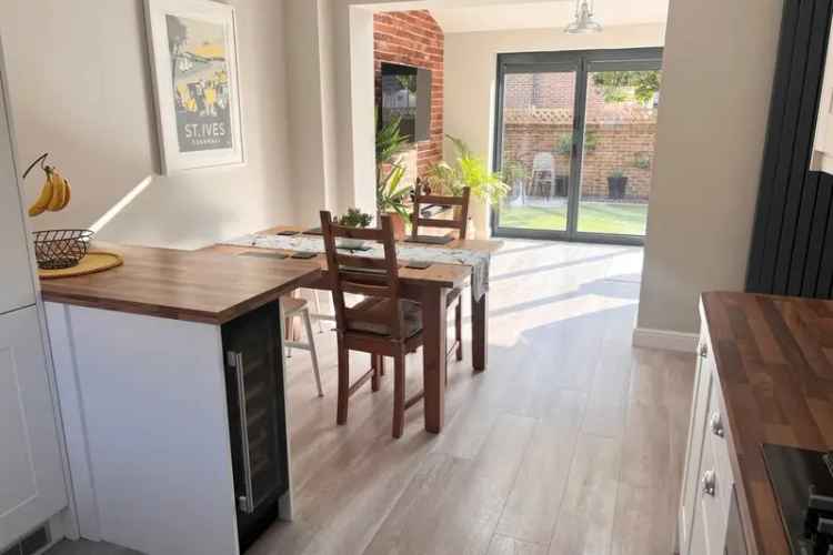 Spacious 5-Bedroom Family Home with Landscaped Garden and Parking