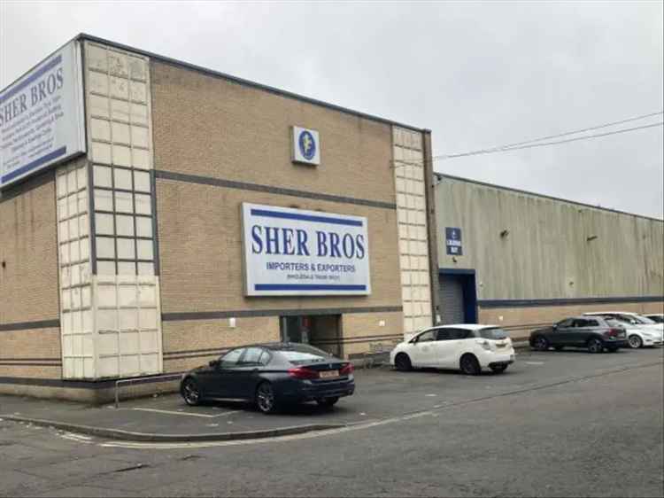 Glasgow Industrial Property: Former Cash & Carry with High Eaves and Parking