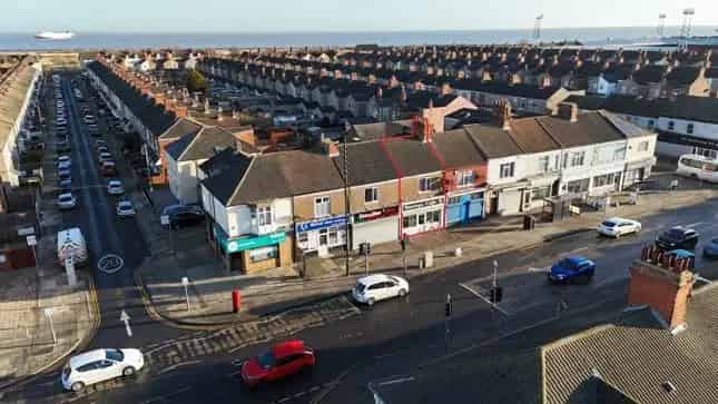 Two Story Mixed Use Property with Retail Unit and Flat