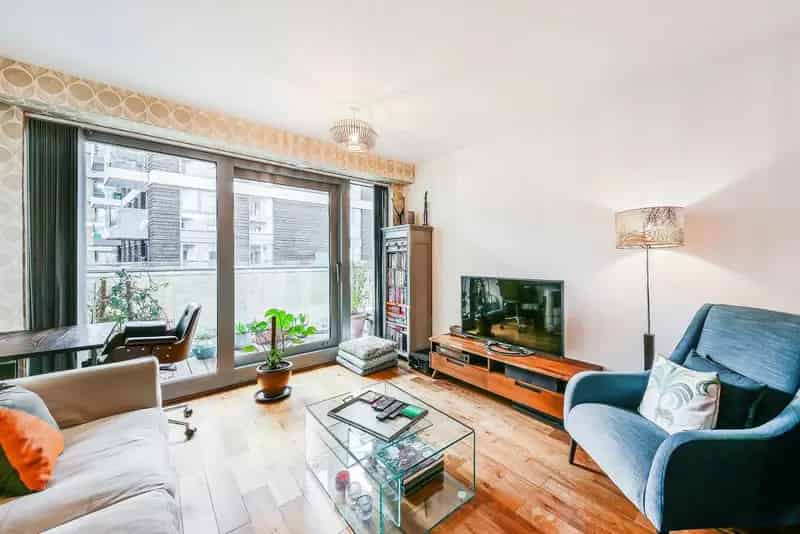 Spacious Riverside Apartment with Balcony and Parking