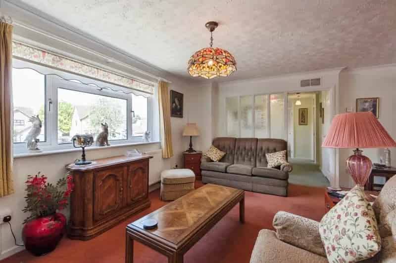 Spacious Detached Bungalow with Landscaped Gardens and Garage