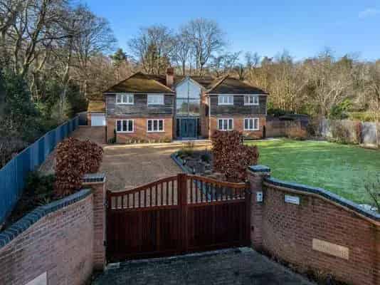 Elegant 5-Bedroom Family Home with Private Garden and Canal Access