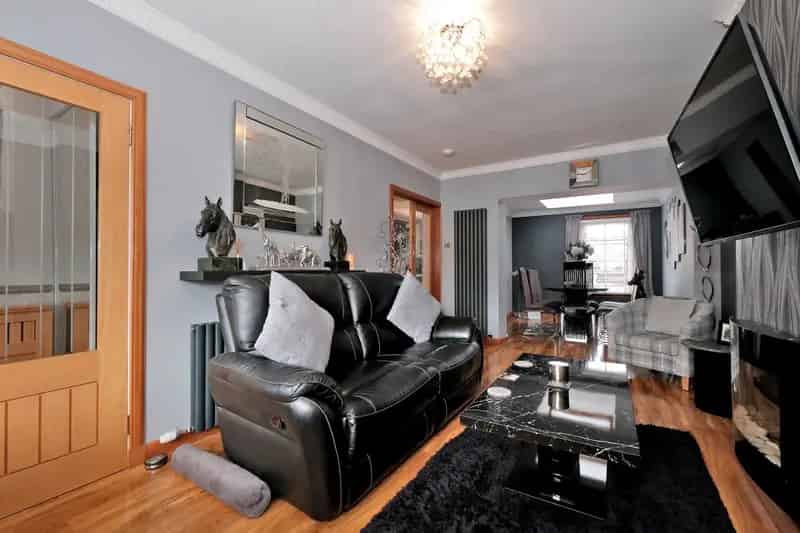 Extended Mid-Terraced House with Attic Room and Garden
