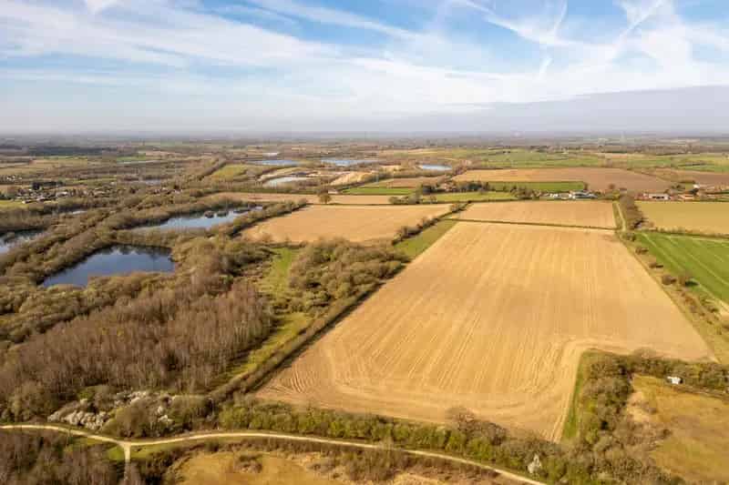 Irrigated Arable Land with Lakes and Abundant Blackberries