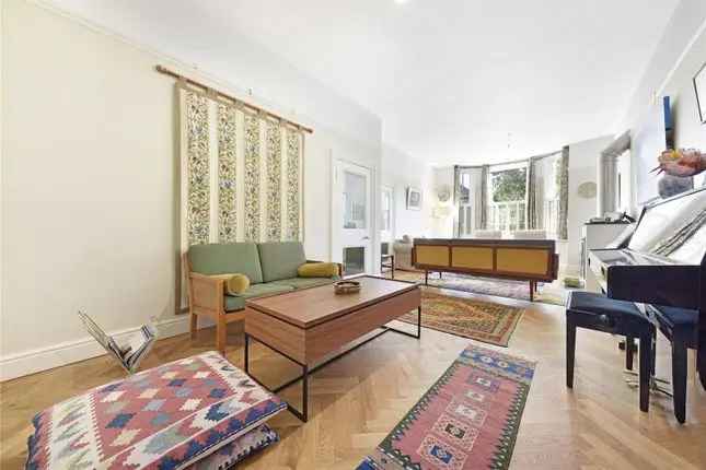 Semi Detached House for Sale in Haydon Park Road London SW19