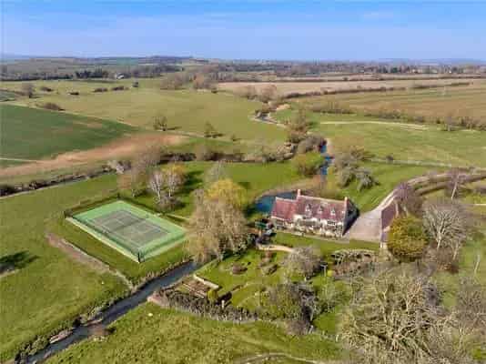 Exquisite Grade II Listed Mill House with Annexe and Tennis Court