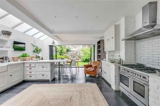 Detached house to rent in Cleveland Gardens, London SW13