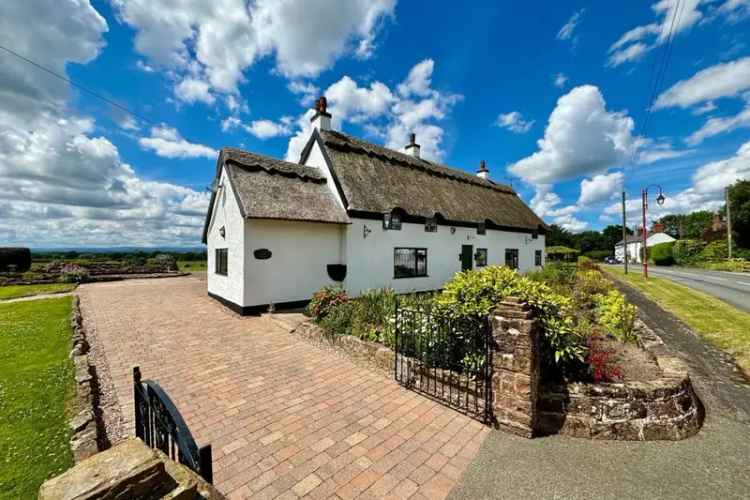 Stunning Thatched Cottage with Outbuildings and Garden