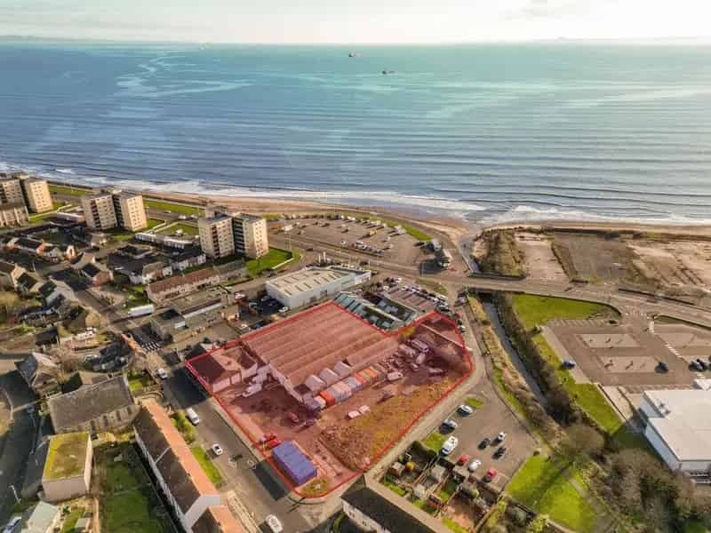 1.6 Acre Site with Warehouse and Retail Parade