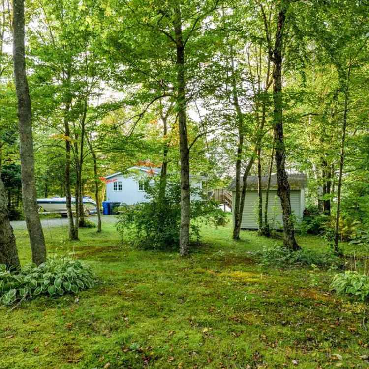 Lakefront 4-Season Cottage with Private Wooded Lot