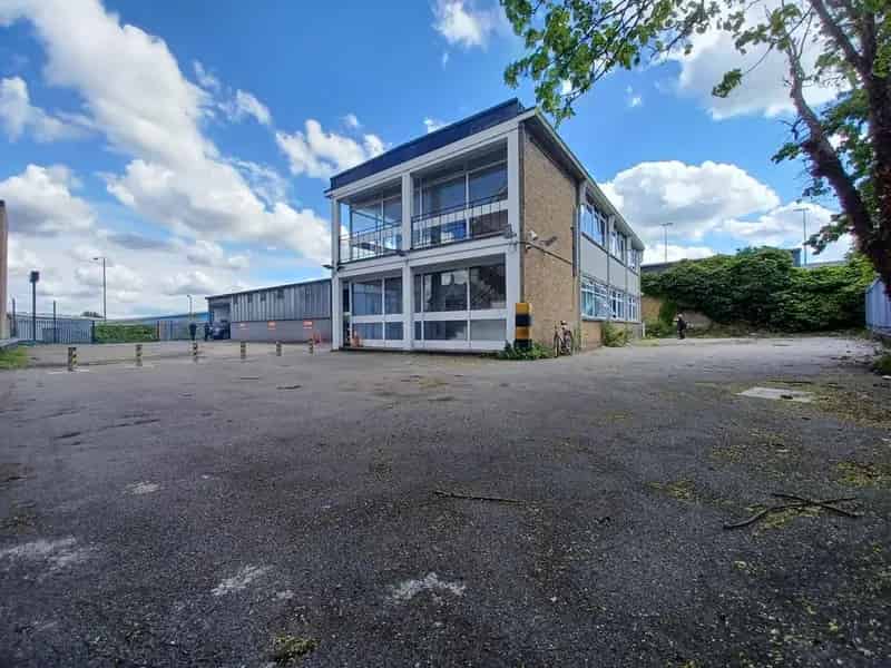 First Floor Office Space with Ample Parking and Secure Yard