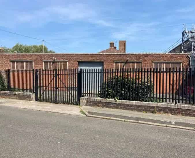 Steel Frame Workshop with Roller Shutter Door and Yard Access