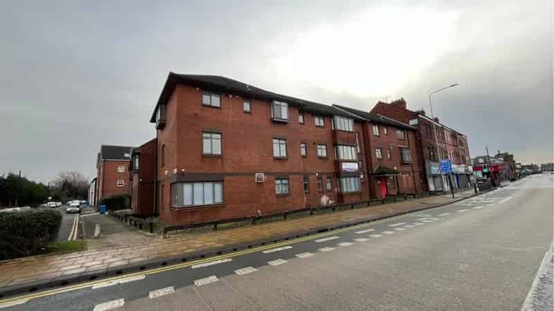 Hostel Building with 8 Flats and 16 HMO Bedrooms and 9 Parking Spaces