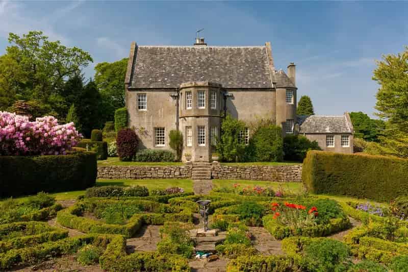 Historic Scottish Baronial Home with Stunning Gardens and Cottage