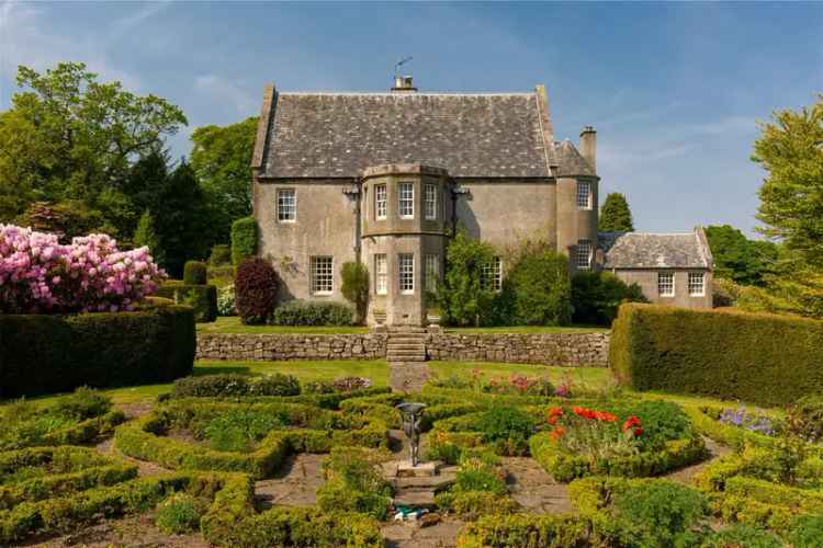 Historic Scottish Baronial Home with Stunning Gardens and Cottage