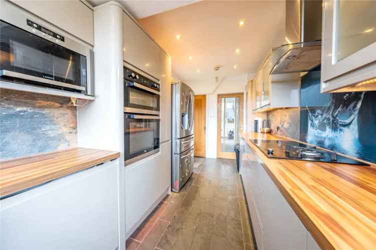 Extended 4-Bed Home with Loft Conversion and Detached Garage