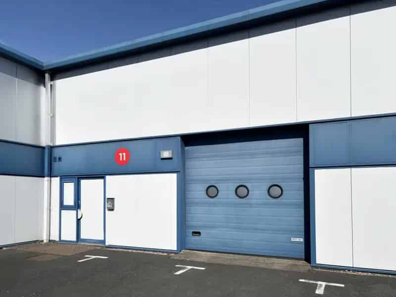 Modern Industrial Storage Unit with Roller Shutter Door