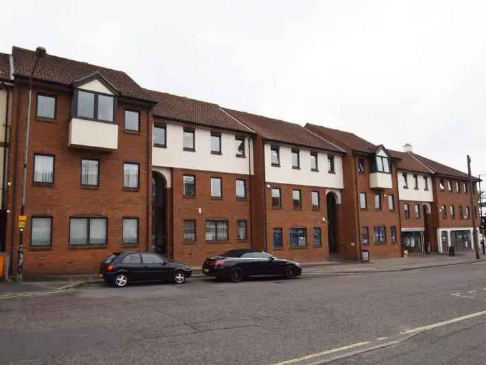 24 Suites in Four Attached Buildings with 55 Parking Spaces