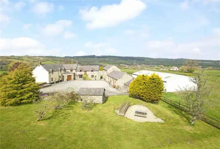 Charming Farmhouse with Cottages and Outbuildings on 12 Acres