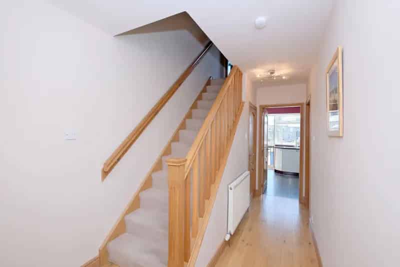 Spacious 3-Bedroom Mid Terraced Home with Garage and Large Loft