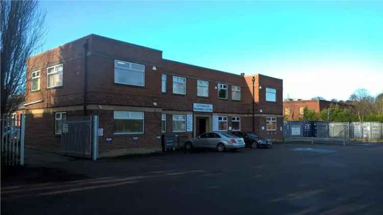 Two Story Brick Office Building with Multiple Suites