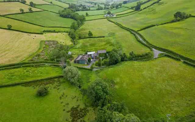 Country Property with Outbuildings and Pasture Land