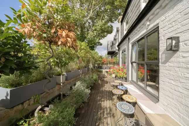 Terraced House for Sale in Russell Gardens Mews London W14