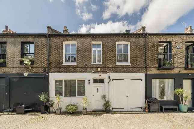 Terraced house for sale in Russell Gardens Mews, London W14