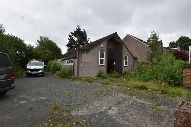 Development Opportunity: 1542 sq ft Detached Building