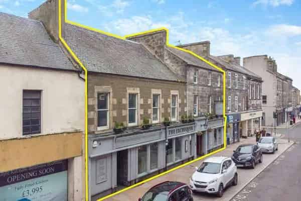 The Exchequer: 3-Story Commercial Property with Manager's Apartment