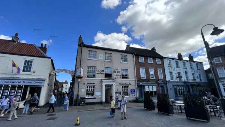 Three Story Commercial Property on Saturday Market