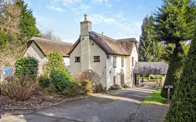 Large Farmhouse with Apartments and Log Cabin near River Towy