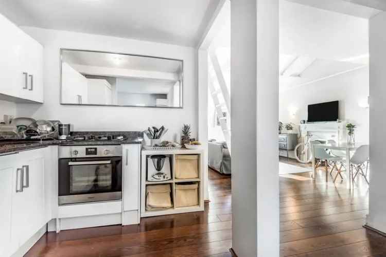 Immaculate 2-Bed Chelsea Apartment with Period Features and Mezzanine