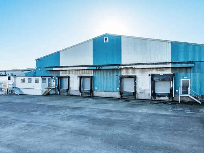 Detached Steel Portal Frame Warehouse with Dock Loading and Concrete Yard
