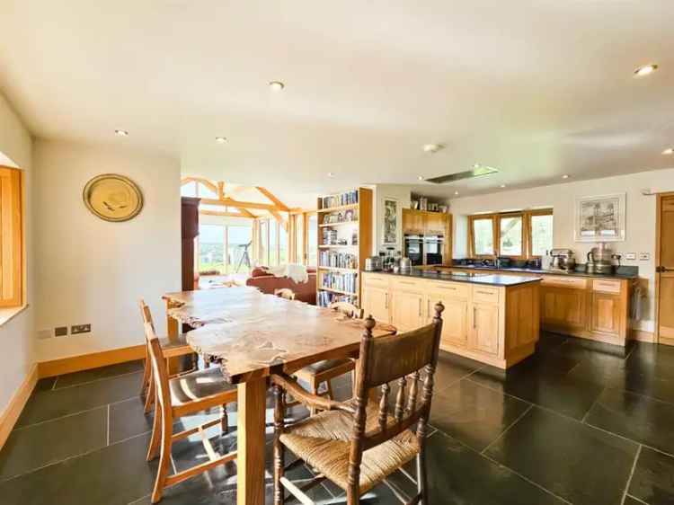 Farmhouse with 3 Converted Barns and Land in North Devon