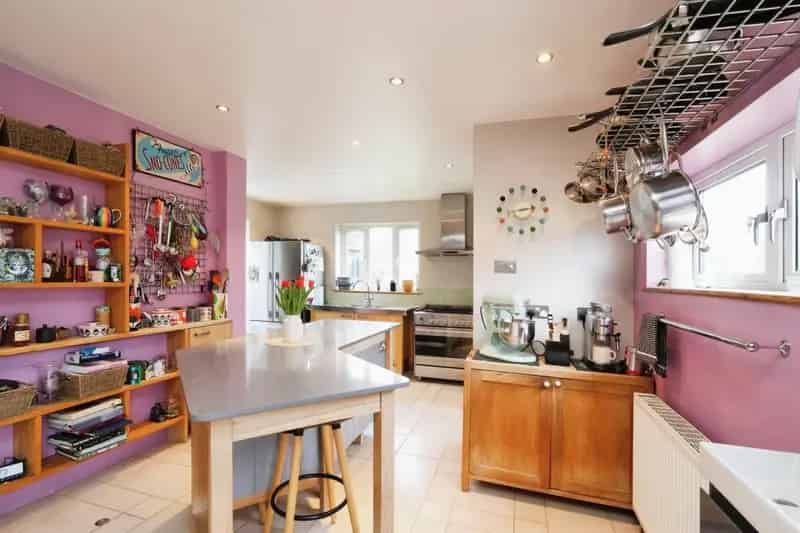 4-Bed House Near Underground Station with Driveway Parking and Garages